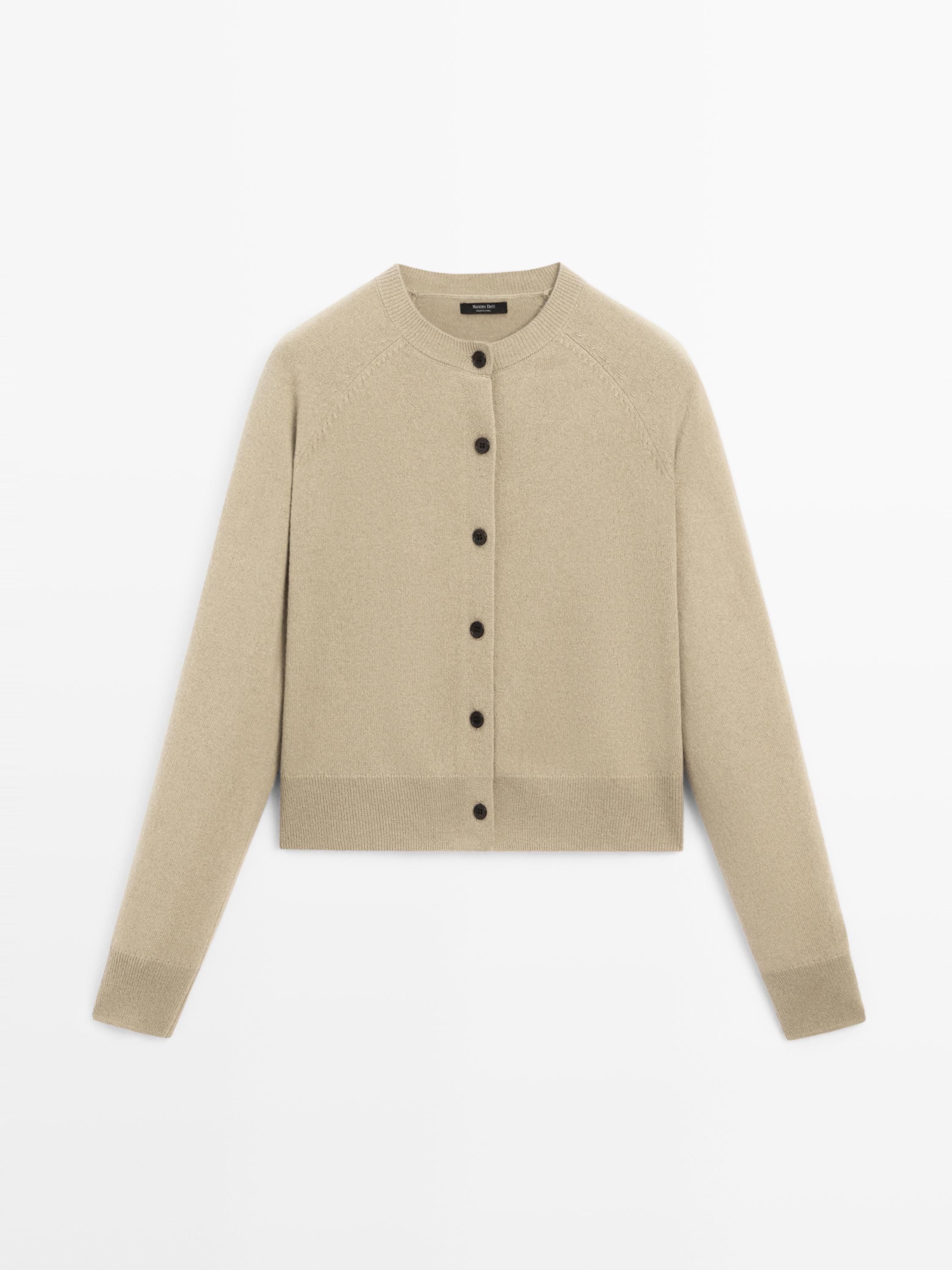 Short knit cardigan with raglan sleeves